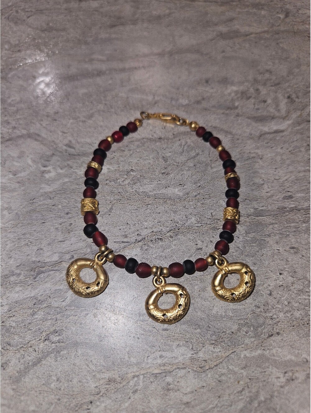 Handcrafted Beaded Bracelet with Gold Tone Charms